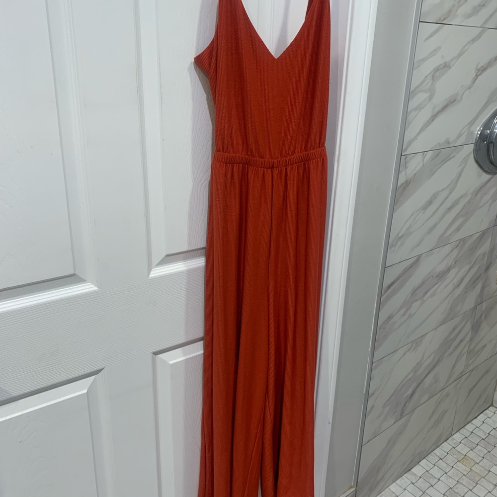 Knit jumpsuit from the Loft. Size M. It runs big. Will fit a large.